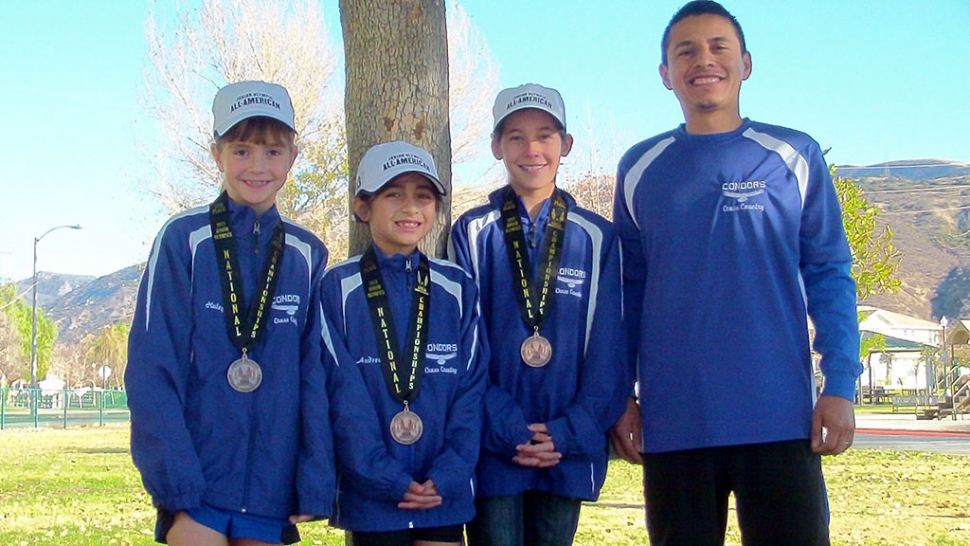 L-r) Haley Wilkinson, Andrea Laureano, Nevaeh Walla and coach Rafael Laureano.