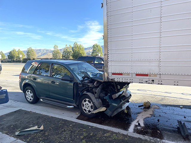 On Thursday, December 18th, at 3:17 p.m., Fillmore Police, Fillmore City Fire, and AMR Paramedics were on scene of a vehicle that crashed into the back of a semi in front of Ameci Pizza & Pasta, no ambulance transports were made. The cause of the crash is under investigation. Photo credit Angel Esquivel.
