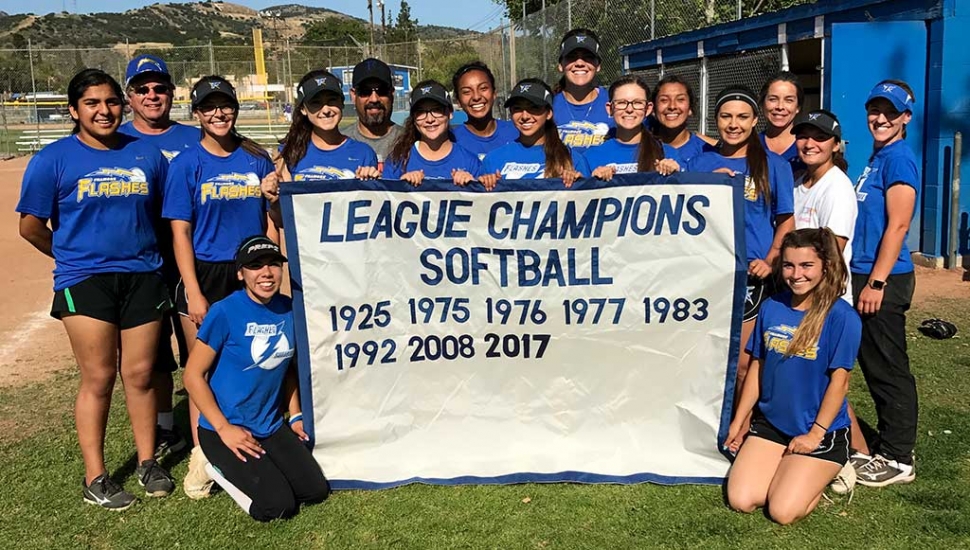 Fillmore High School’s 2017 Softball League Champs, are pictured with the Champions banner. Photo Courtesy Coach Kellsie McLain.