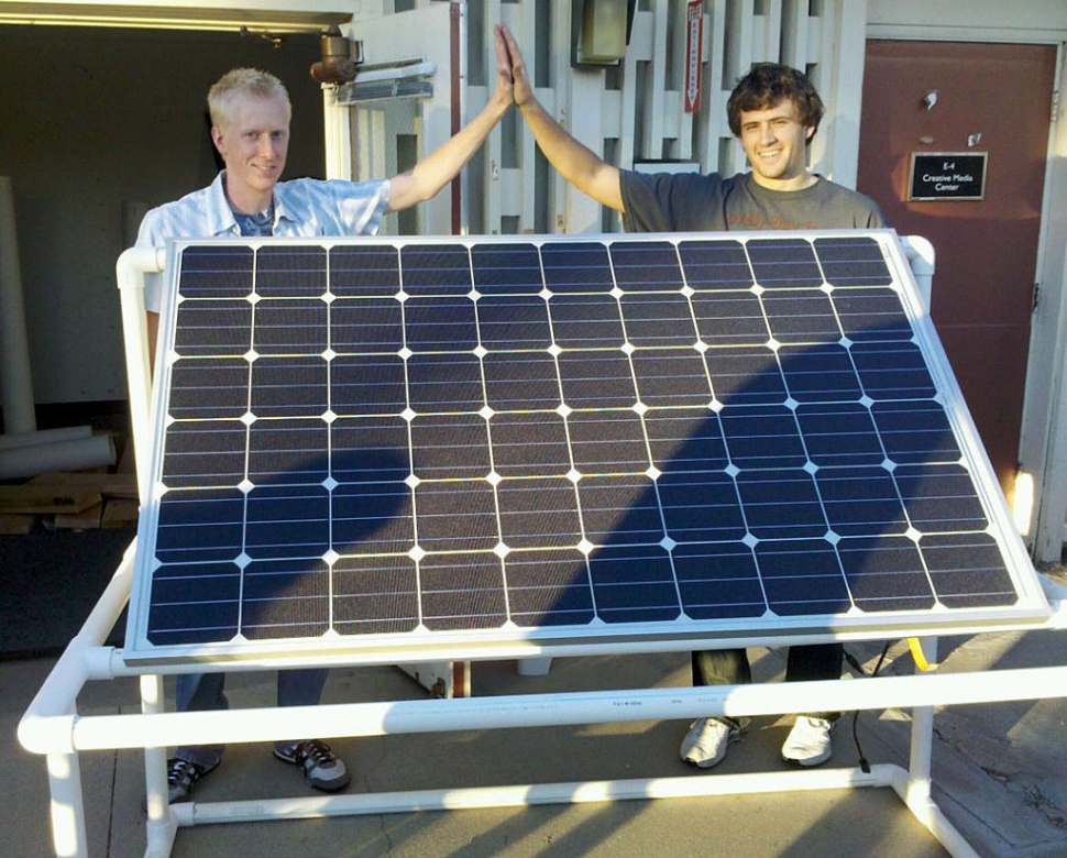Sophomore bioengineering majors Josh Miller of Escondido and Zach Flagg of Meadow Vista display the solar panel and pipes the students put together for the fountain.