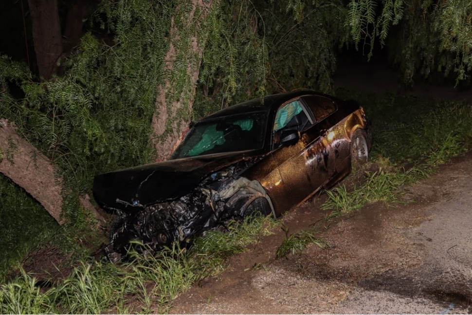 On Tuesday, April 4, 2023, at 1:16am, Ventura County Fire Department, AMR Paramedics, and California Highway Patrol were dispatched to a vehicle accident at Center Street and Orchard Street, Piru. Arriving firefighters found a black BMW with front-end damage along with guardrail damage (inset) on the westbound side of Center Street. While CHP was enroute firefighters along with paramedics searched for any occupants; they were unable to locate any patients. According to a passerby, an unknown number of subjects were seen running eastbound over the Center Street bridge. The incident is under investigation by CHP-Moorpark. Photo credit Angel Esquivel-AE News.