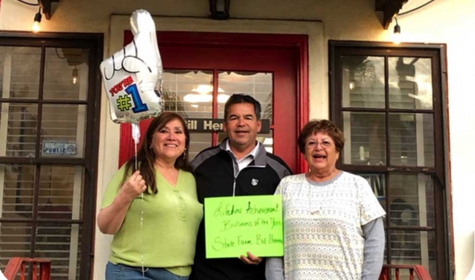 Pictured is State Farm Insurance Team (l-r) Debbie Sanchez, Bill Herrera and Mrs. Herrera as they smile for a photo after receiving the Lifetime Achievement Business of the Year 2017 by the Fillmore Chamber of Commerce. Courtesy Ari Larson.