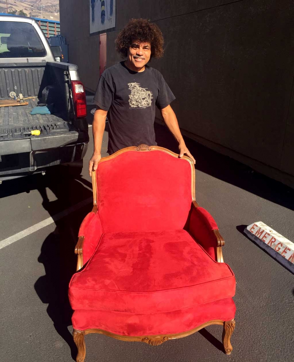 Steve Butcher and friends all pitched in to buy a red chair for Santa Claus off of Craigslist and donated it to the Fillmore Fire Department. They will also store the chair for free for Santa. Photo courtesy of Fillmore Fire Department.