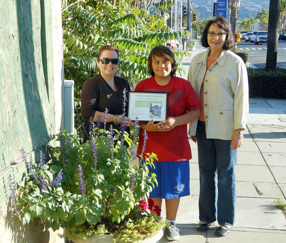 Theresa Rohbledo & son Adrian with their certificate and Civic Pride member Linda Nunes
