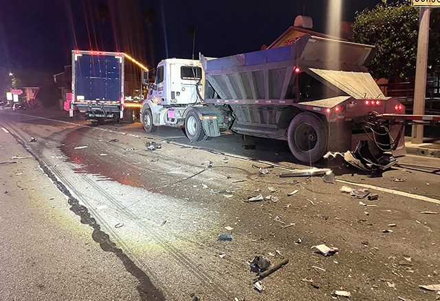 On Friday, October 31st, at 6:21 a.m., Fillmore Police Department, Fillmore City Fire, and AMR Paramedics were dispatched to a collision on Ventura Street at Santa Clara Street. Arriving firefighters found a box truck that had collided with a parked semi-truck; the driver of the box truck had minor injuries. The crash is under investigation. Photo credit Angel Esquivel.