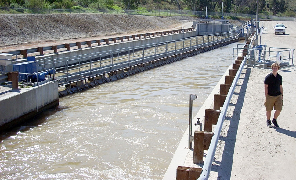 Above the diversion channels river water to the spreading grounds, large shallow reservoirs composed of sand and gravel layers that naturally filter water as it seeps back into the ground.