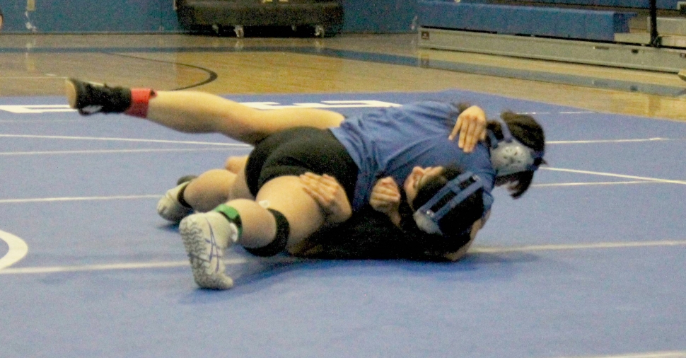 On November 13, Flashes Boys & Girls Wrestling hosted an intra-squad scrimmage meet to prepare for the upcoming season. Above is Christine Panopio vs. Skyla Sandoval.