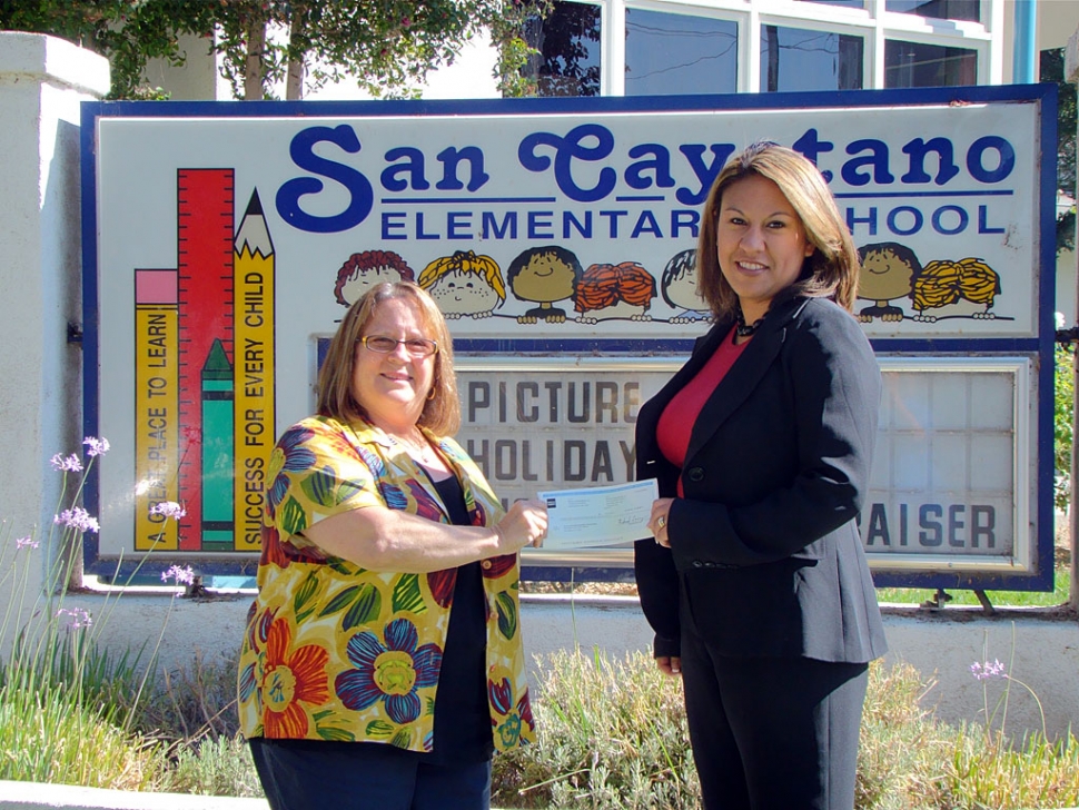 Christie M. Ponce, Branch Manager of our local Wells Fargo is shown handing Jan Marholin, Principal of San Cayetano a check for $4100 to cover the costs of the annual Harvest Festival/Fall carnival. This will be the third year that Wells Fargo has partnered with the elementary schools to host this community event. All profits from the event are split among the elementary staff working the event to be used in their classrooms. The date for the October event this year is Thursday night October 28th from 5-8PM. More details will be available at a later date.