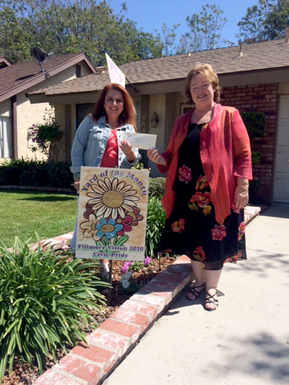 Theresa Robledo with Civic Pride Vision 2020 presents Yard of the Month to Ms. Joan Archer. Please drive by 644 Fernglen to view. Quoted by Ms. Archer: 