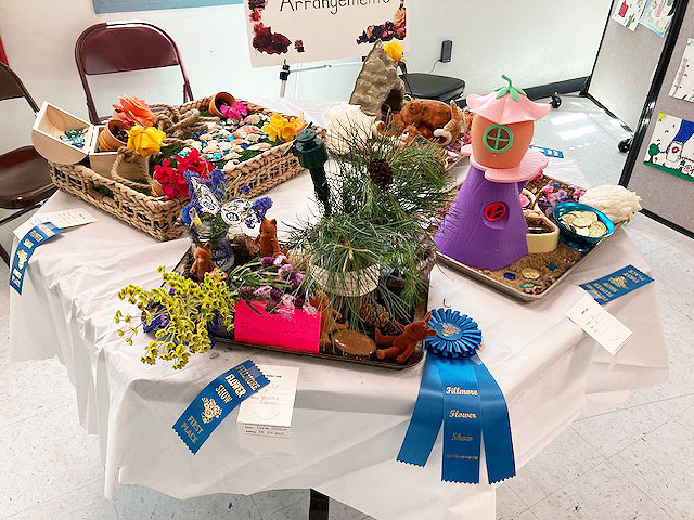 On Saturday/Sunday, April 26th & 27th, the Fillmore Flower Show will take place at the Fillmore Active Adult Center, 533 Santa Clara Street. Entry check-in for the show is 7am – 10:30am and public viewings will be from 1pm – 4pm. This is a free event for all ages to enjoy. Pictured above are some of the Youth Display’s from a previous flower show. Photo credit Jan Lee.