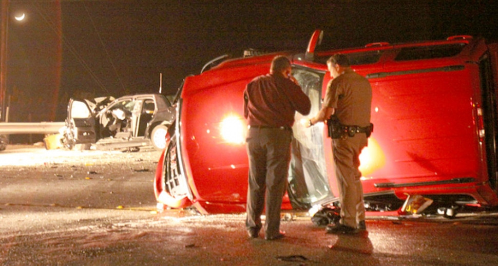 (foreground) The overturned truck Mayra Tellez, age 22 of Santa Paula, was ejected from. (background) The patrol vehicle Deputy William Meixner and Deputy Beau Rodriguez were extracted from. Photo courtesy Sebastian Rameriz.