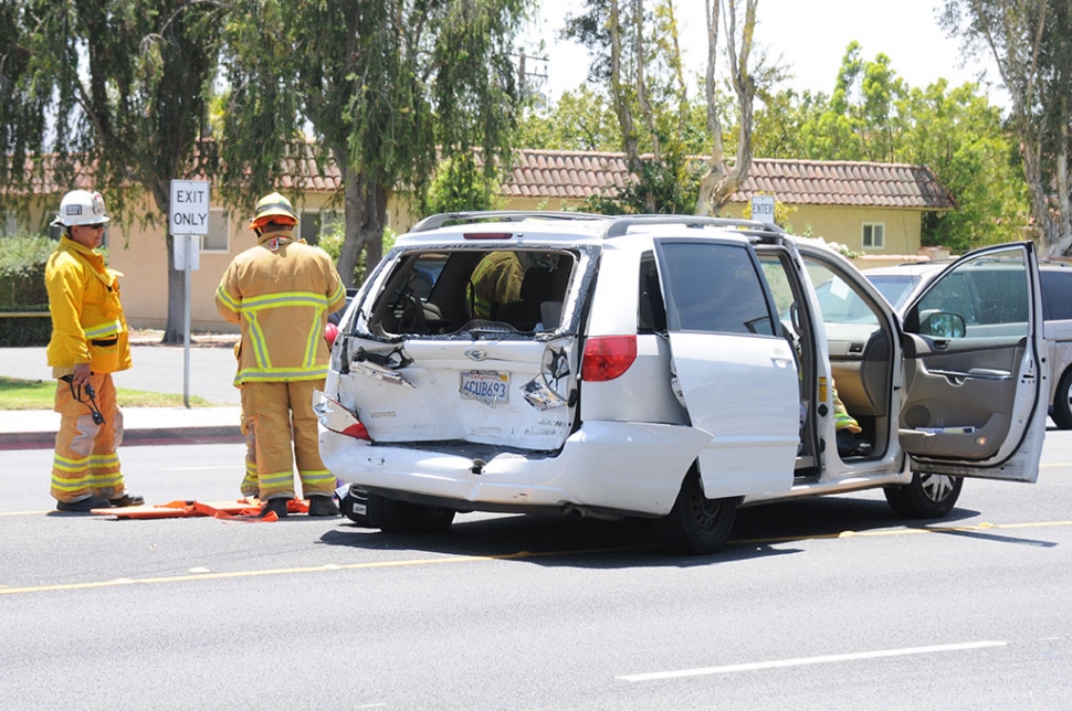 On Saturday, at approximately 1:15 p.m., a collision between a small pickup truck and a van occurred on Highway 126 near A Street.. The truck struck the rear end of the van causing considerable damage. The female driver of the van was taken away by ambulance. The extent of her injuries were not reported. 