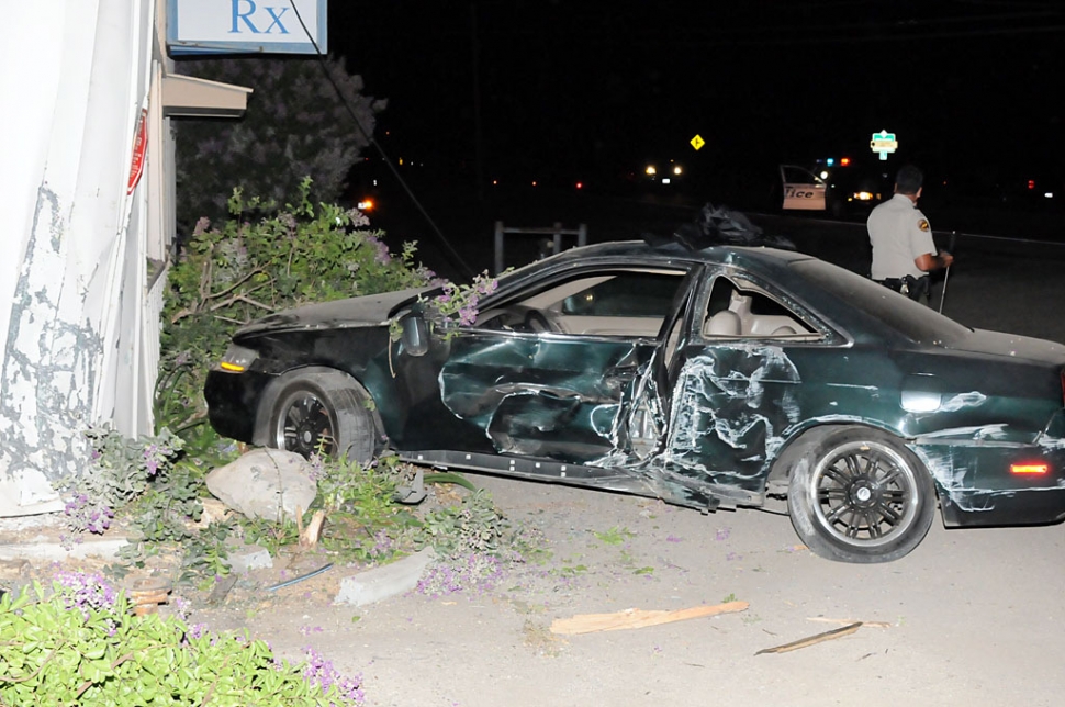 Substantial damage was done to the building as well as severe damage to the car.