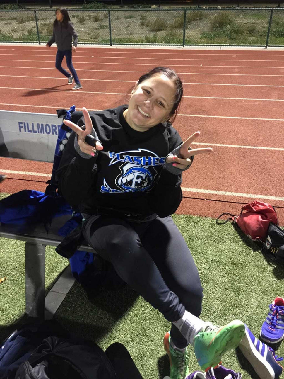 Trina Tafoya celebrates after scoring the second goal for the alumni team in the last seconds of the second half.