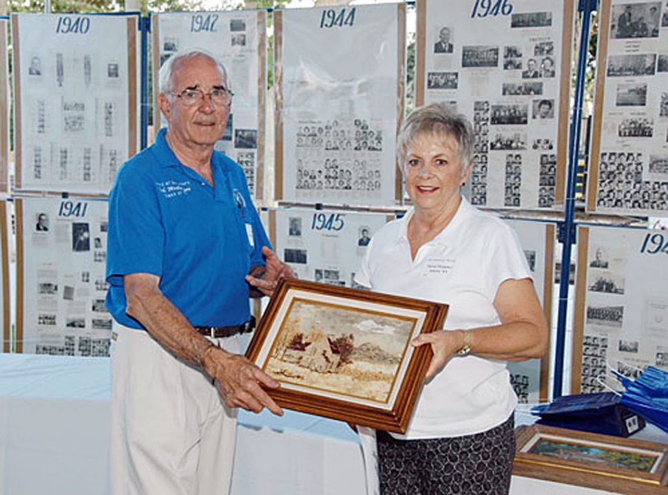 Susan Steppler Adams receiving the Toolie Palmer bark art as first prize in drawing. For more photos, visit http://www.fillmorehighalumni.com/alumnidinner