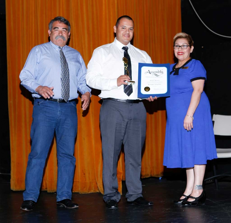 (center) Firefighter of the Year Michael Salazar.