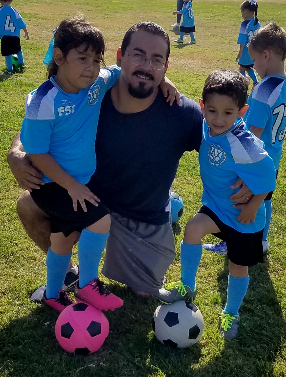 Fillmore AYSO Youth Soccer is in full swing on September 29th the held their 5th week of games at Sheills Park players and at Shiells park in Fillmore. Pictured are two players with their dad enjoying a fun weekend of competition. Photos courtesy Coach Omero.