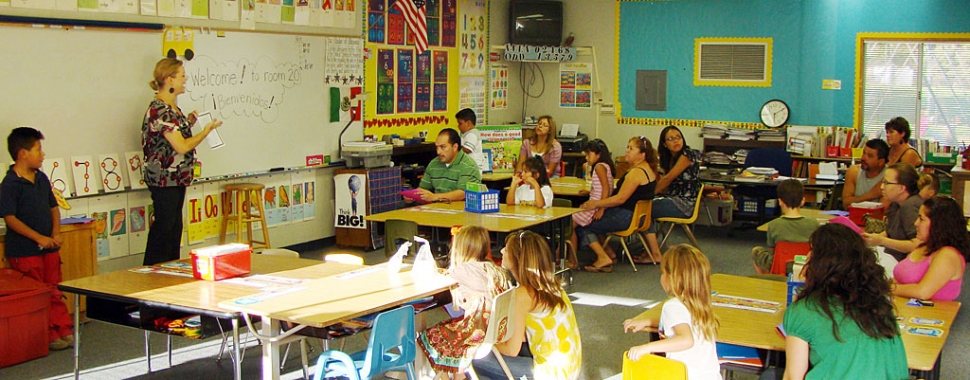 Kassie Chambers, 1st grade teacher speaks to parents and students at San Cayetano’s Back to School Night last week. Each teacher gave an overview about their classroom rules, discipline procedures  and expectations for instructional work at that grade level.