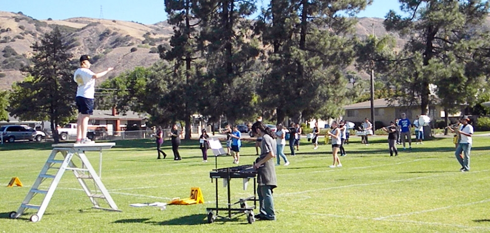 Fillmore Band Booster Practice
Fillmore High School and select Middle School students are shown practicing Saturday, Sept.25th on the old Middle School baseball field. They were getting ready for countywide field show competitions. The students practiced from 9a.m.-2 p.m. in 90 degree weather; now that’s dedication.