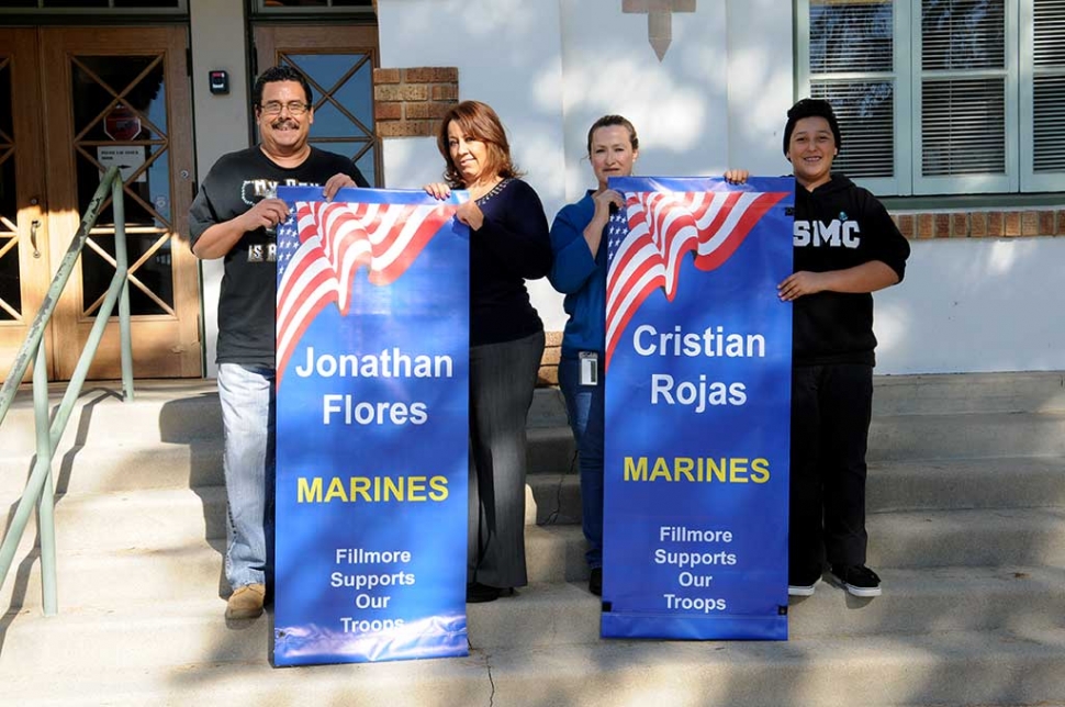 New military banners were presented in front of the Fillmore Unified School District on Wednesday, November 18th. The Flores and Rojas families were proud to take part in the ceremony on behalf of Jonathan Flores and Cristian Rojas, both now serving in the U.S. Marine Corps. Members of Fillmore’s local VFW Post 9637 were also in attendance to honor those who serve.
