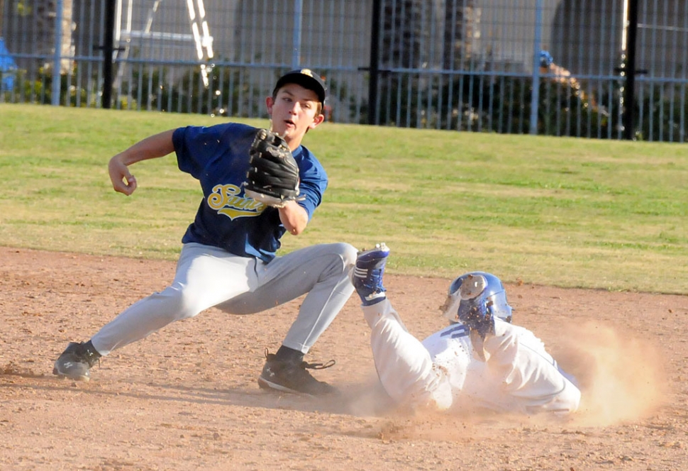 A Fillmore player slides safely into second base. Alan Lizarraga pitched 5 2/3 innings earning a win. Johnny Wilber was 2 for 3 with 2 RBI’s. Fillmore won 9-3.
