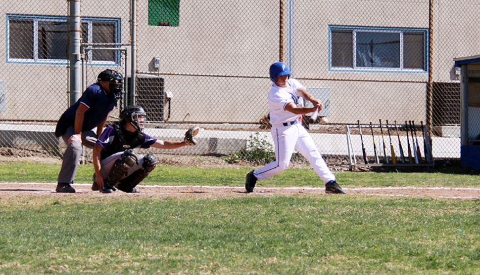 David Esquivel hits the ball down the middle against L.A. Baptist last Saturday, March 7, 2009.