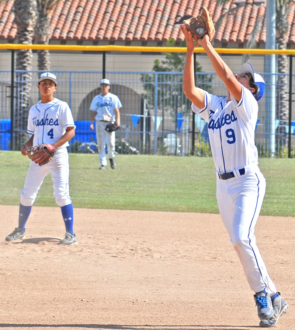 Adreas Robles makes a great catch at second base.