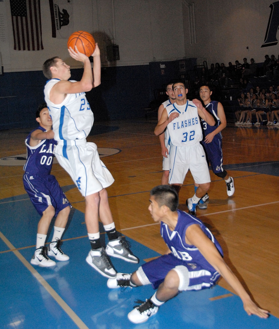 Corey Cole #25, shoots for two. Cole scored 7 points along with 4 assists. Angel Barajas contributed 5 points and 9 rebounds.