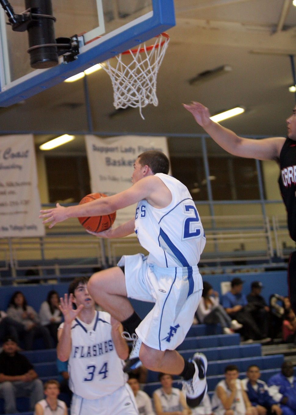 James Nelson makes his move towards the basket. The Flashes placed second in the Fillmore Tournament this past weekend. They beat Channel Islands and Carpinteria and lost to Oaks Christian.
