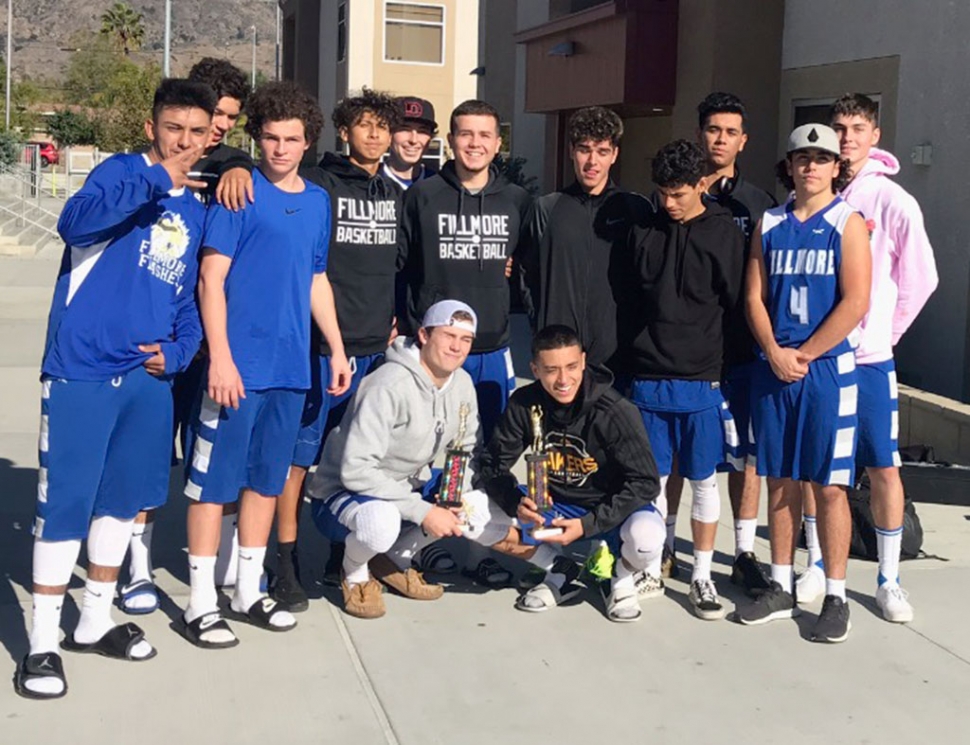 The Fillmore Flashes Boys Basketball team with their 1st place trophy as well as Flashes Jake Saviers with his MVP trophy from the Northeast Valley Tournament. Photos courtesy Coach Mark Blankenship.