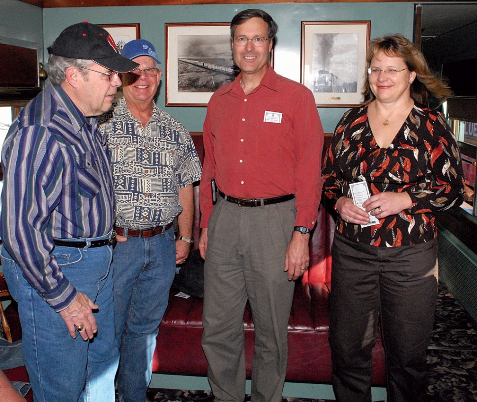 From left, former Fillmore Mayor Don Gunderson, former City Manager Roy Payne, former City Engineer (Director of Public Works) Bert Rapp and his wife Renee board the special train at city hall waiting to take them to a farewell party. Rapp resigned his position after 19 and a half years with the city. Approximately 40 friends, former colleagues and fellow employees gathered for a bar-b-cue at a private residence.