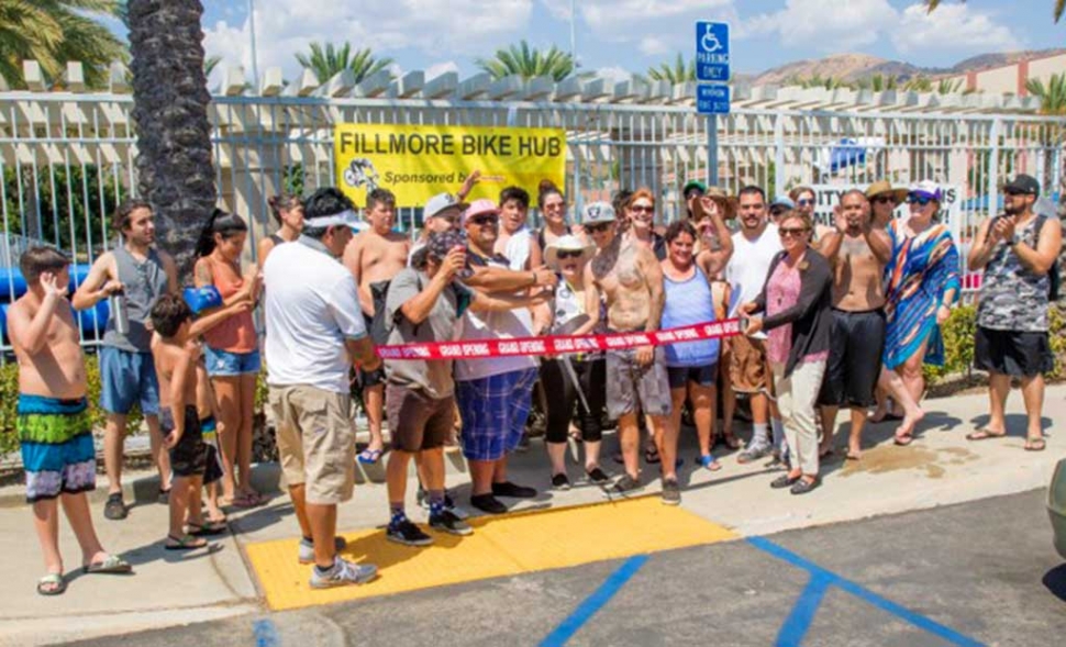 Fillmore Chamber of Commerce welcomed the Bike HUB by hosting a ribbon cutting ceremony. Pictured above are Ralph Jimenez (Pres. Fillmore Chamber), Jaime Ambriz (Bike HUB Project Mgr.), Ari Larson (Fillmore Chamber Board Dir.), Martha Espinoza, Michael Espinoza, Eric Maynard, Timothy Cox, Danny Meraz, Jena Branstetter (Bike HUB Board Secretary),Yvonne Adan (Bike HUB Board of Directors), John Vargas, Martin Gonzalez, Aaron Sandberg, Dulce Cox, Nathan Cox,Timmy Cox and Joshua Cox. Photo courtesy Ron Parker.