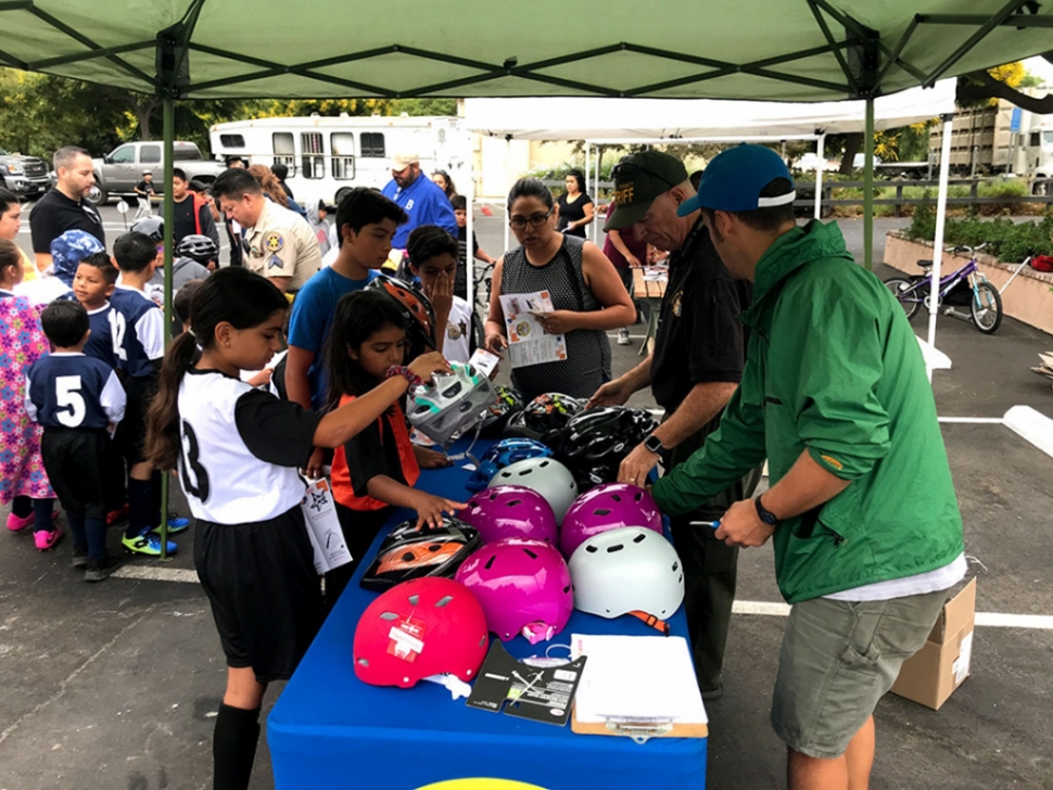 On Saturday, September 17th from 9am to noon, at San Salvador Church in Piru, the Fillmore Citizens Patrol will host their 2022 Bicycle and Skateboard Safety Rodeo. They will Raffle off a bike, skateboards and scooters, hold a bike and safety course for basic riding skills and give out free helmets while supplies last. Be sure to take your bike or skateboard. Above and below are photos from a previous rodeo back in 2019. Note: This is not a Fillmore Unified School District sponsored program, and Fillmore Unified School District accepts no liability or responsibility for this program/activity.