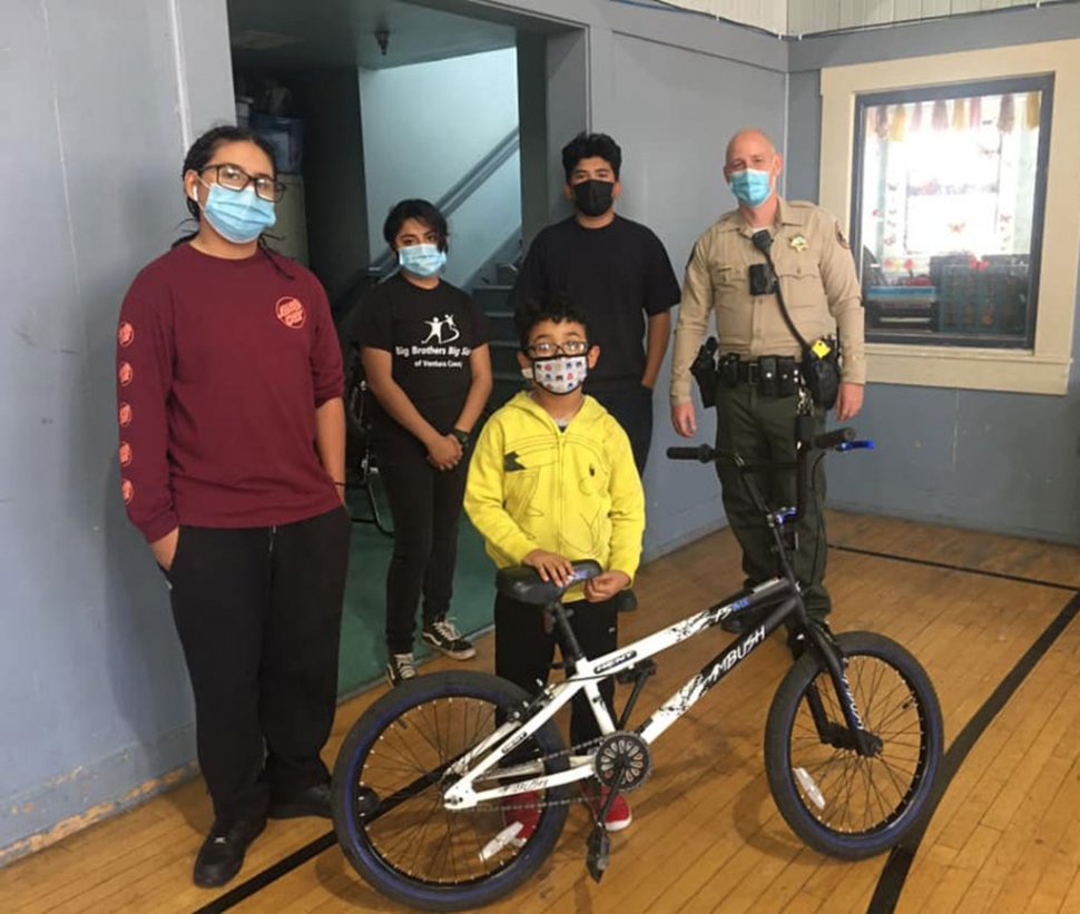 The Fillmore Boys & Girls Club Bike Builders Club would like to give a big shout-out to School Resource Officer Jonathan Schnereger for supplying the bikes that needed some TLC! Also, Fillmore club member Odel getting the first refurbished bike, presented to him by the builders and Officer Schnereger. Thank you to all our partners. Photos courtesy Santa Clara Valley Boys Girls Club. 