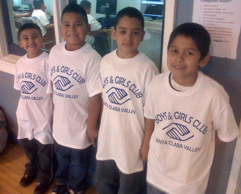 Photo Caption: Club members proudly show off their new tee shirts.