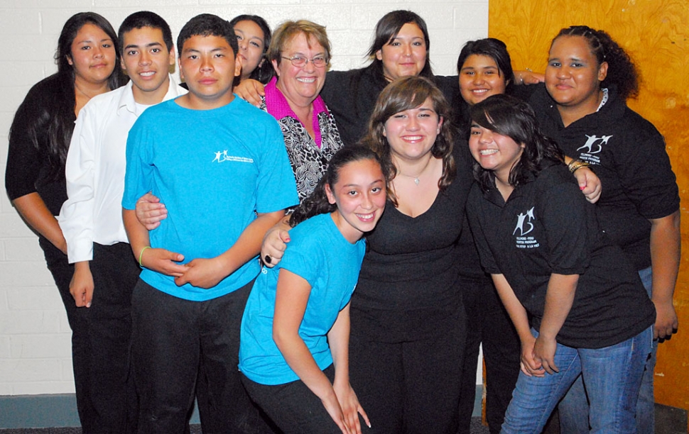 Lynn Edmonds poses with youth from the Fillmore/Piru Boys & Girls Club, who had the honor of serving dinner to Lions club members, Monday night.