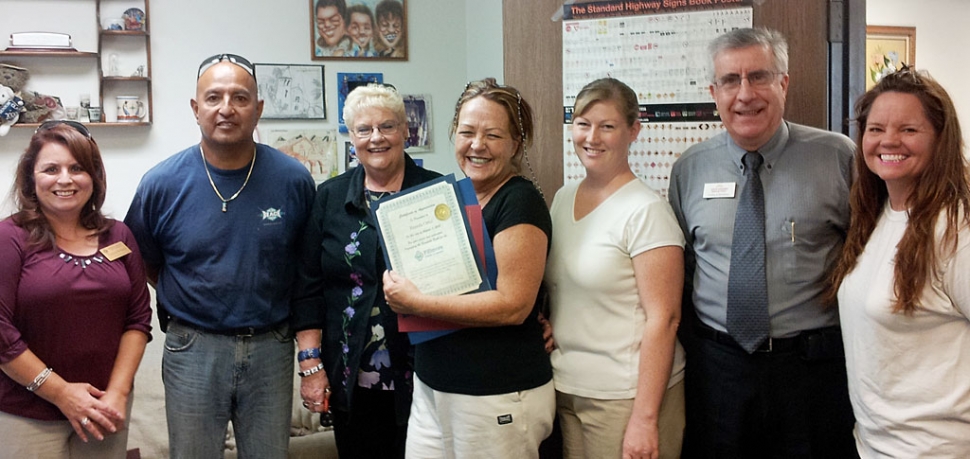 Fillmore Chamber of Commerce presenting board director, Brenda Ortiz, with her husband Eddie Ortiz, a certificate of appreciation for volunteering to run the fireworks booth the entire week, day and night. Brenda also received a certificate from Tony Strickland and Jeff Gorell.