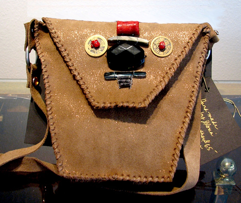 Suede Handbag with beaded embellishment by Gloria Rupio.