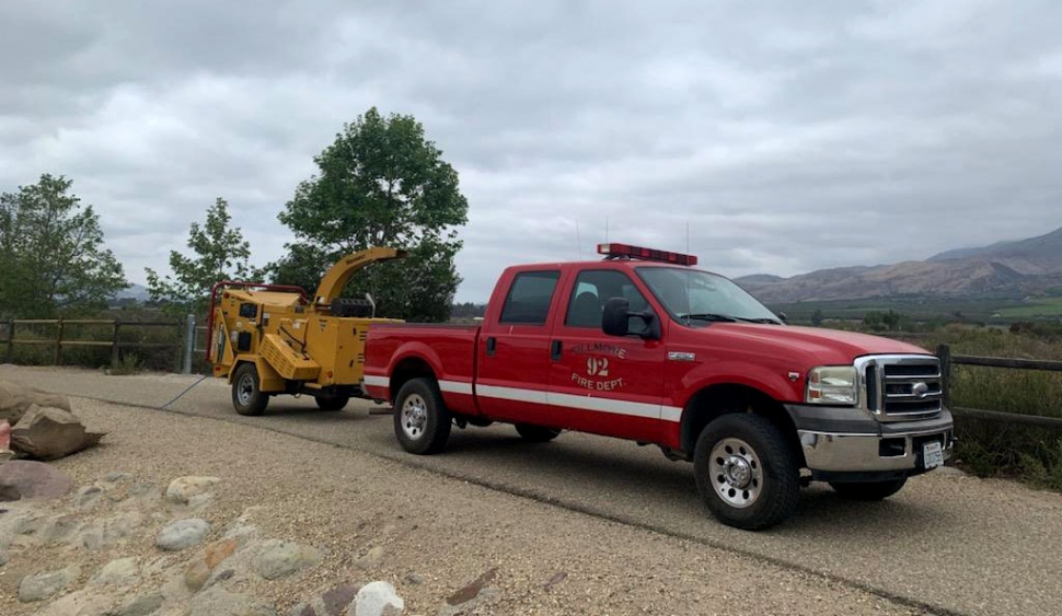 Fillmore City Fire crews were out working on local bike paths, clearing away overgrown brush last weekend. Pictured is one of the vehicles pulling a woodchipper.