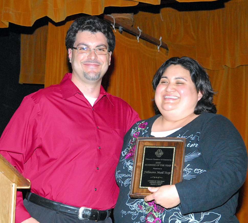 Business of the Year Kathy Vargas of Mail Stop and Micky Rubino.