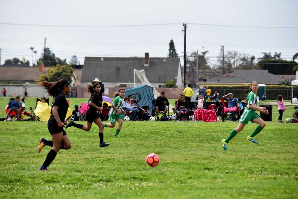 California United Forwards Marlene Gonzales and Jadon Rodriguez pressure the Nacional defense with their great speed and ball skills. Final score 2 – 1 California United. Photo courtesy Evelia Hernandez.