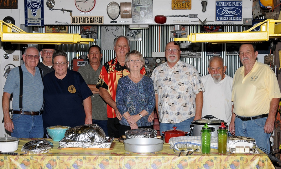 26 people attended the 2nd Annual Faders Car Club Thanksgiving dinner. (l-r) Jim and Judi Clark (front left), behind them Jerry Morford, Tony Morales, Pat and Carol Askren, Roger Campbell, Hasher Haase and Wally Litten. The dinner at the Faders Garage (Dewey Thompson Auto Parts).