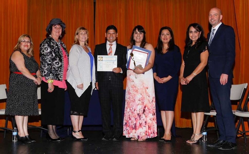 New Outstanding Business of the Year Fro-Yo Frozen Yogurt & Treats. Owner Everardo Magana is pictured center.