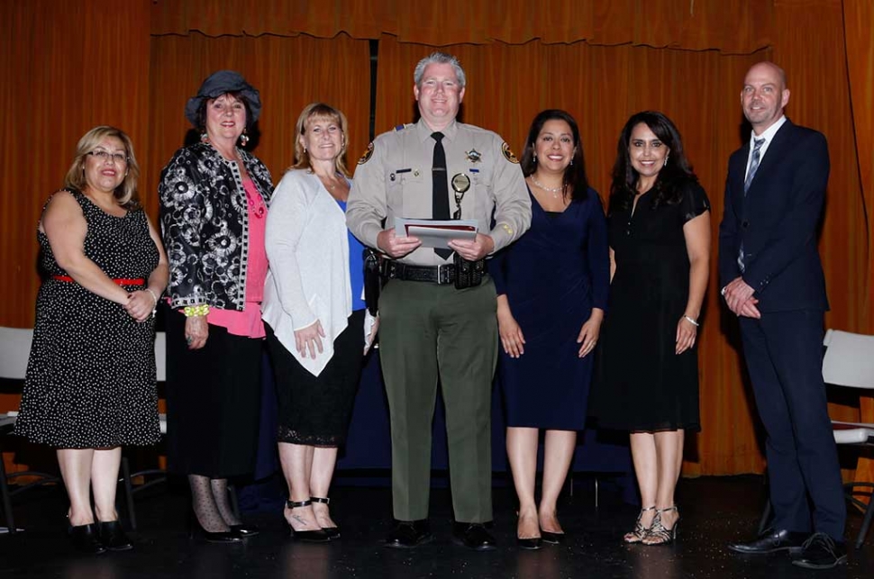 Officer of the Year Deputy Andrew Littlefield, pictured center.