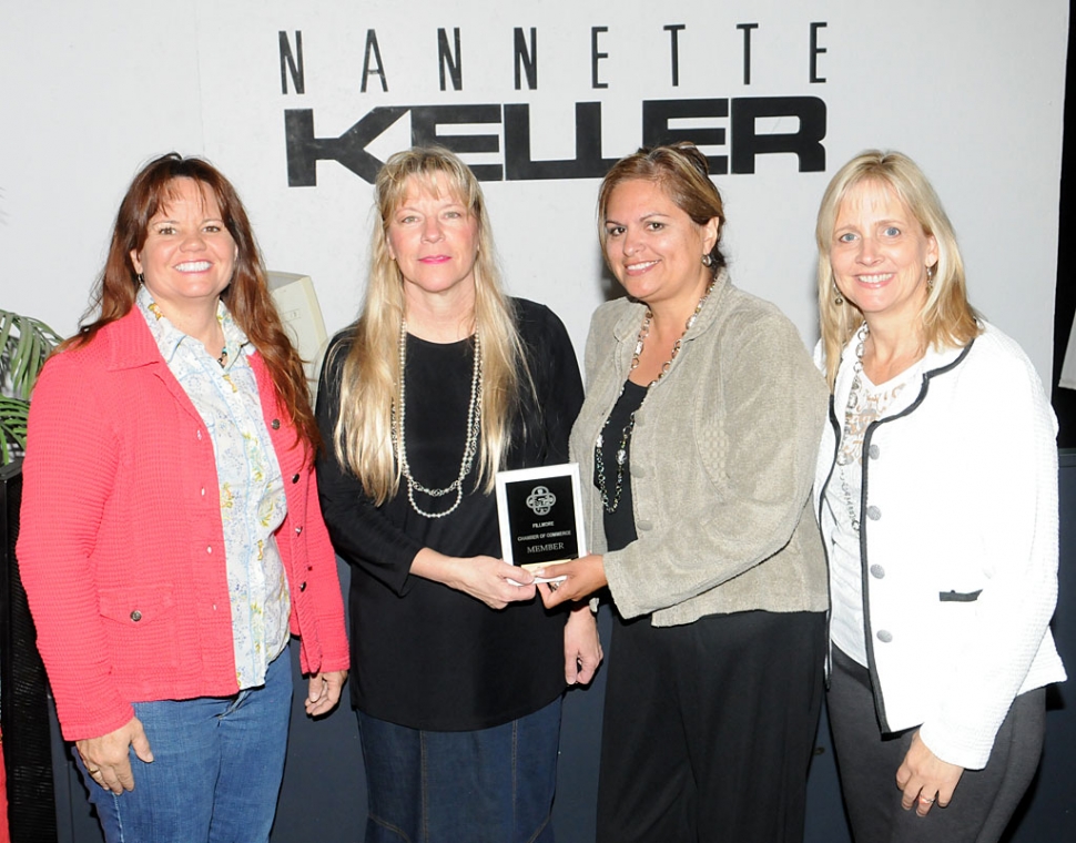 Pictured (l-r) Cindy Jackson, Nannette Keller, Ari Larson, and Tammy Hobson presented a plaque to Nanette Keller, from the Fillmore Chamber of Commerce.