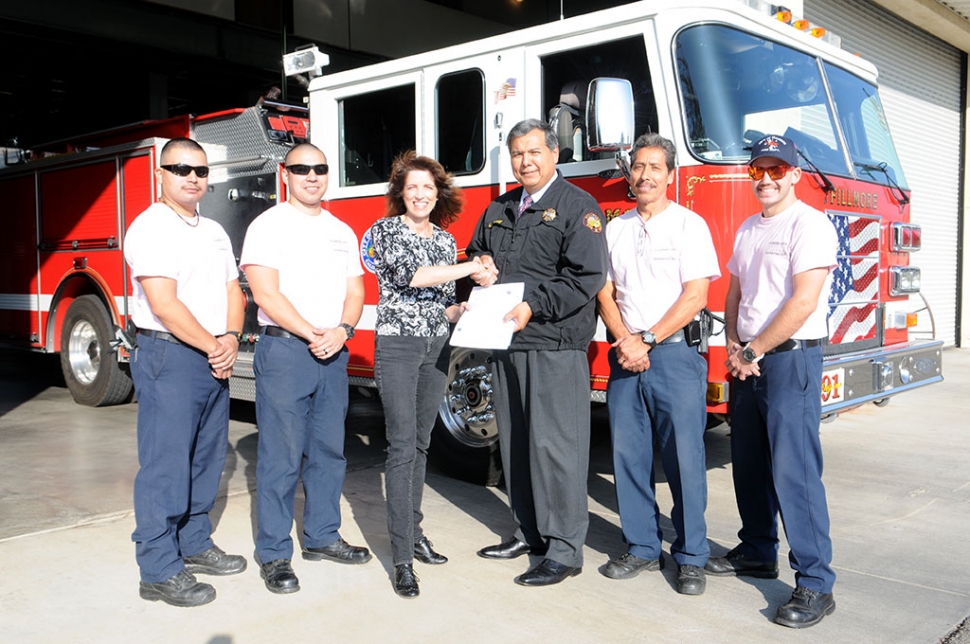 On behalf of the City of Fillmore, the Fillmore Volunteer Firefighters Foundation and its members, we would like to thank Chevron USA for their donation of $3,000. Chevron has been a great supporter for the City of Fillmore and many of the organizations within the City. This donation will be used to fund training, education, and to purchase and replace much needed equipment. We would like to offer a special thank you to Leslie Klinchuch, shown shaking hands with Fillmore Fire Chief Rigo Landeros, for her continued support of the residence of Fillmore.