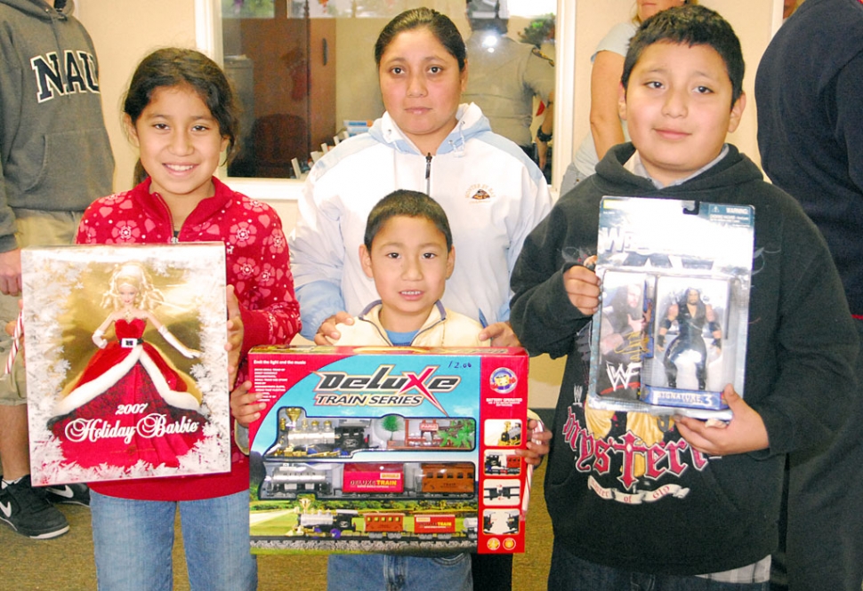 A lot of kids received presents at the Police Storefront Christmas party, Monday, December 21st.