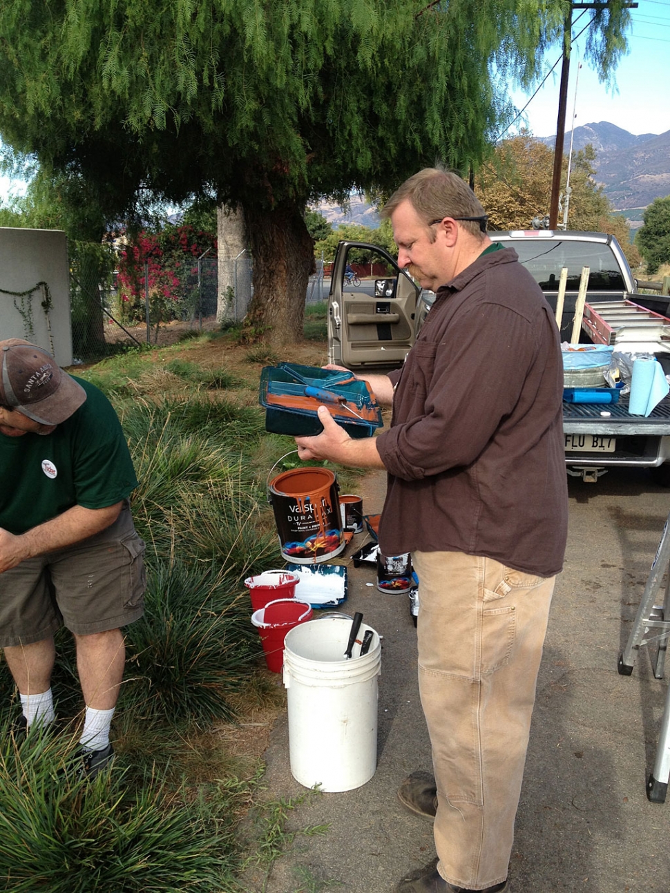 Council candidates Doug Tucker and Rick Neal worked on graffiti cleanup, along with other concerned citizens over the weekend.