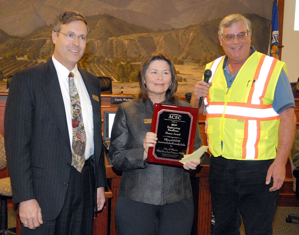 Bert Rapp Receives Prestigious ACEC Award. Rapp lead the city in engineering excellence for 20 years. The American Council of Engineering Consultants 2010 Engineering Excellence Honor Award for the City of Fillmore Water Recycling Program was presented to exiting Public Works Director Bert Rapp after 20 years of excellent service to the city. Presenting the award was Mayor Gayle Washburn and Doug Haack, Construction Observer with AECOM.