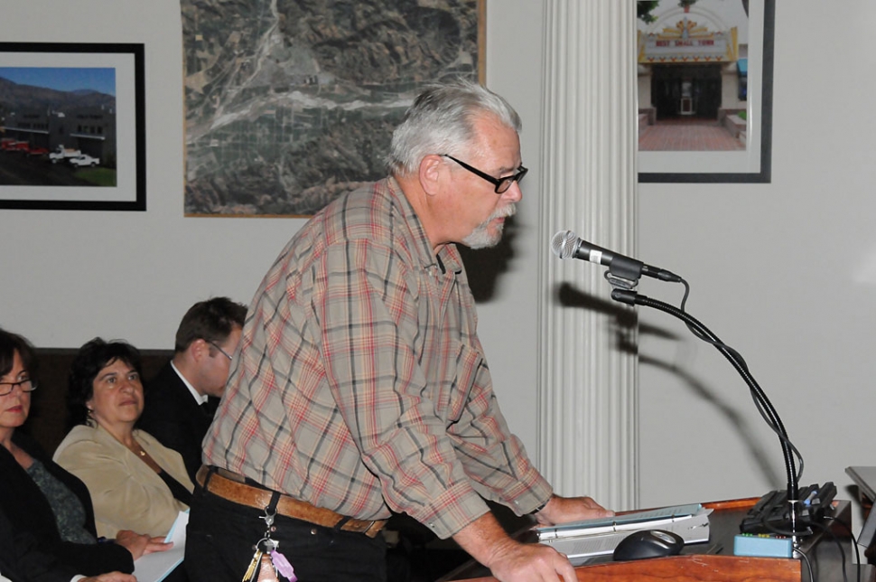 Planning Commissioner Vance Johnson reads his resignation letter.